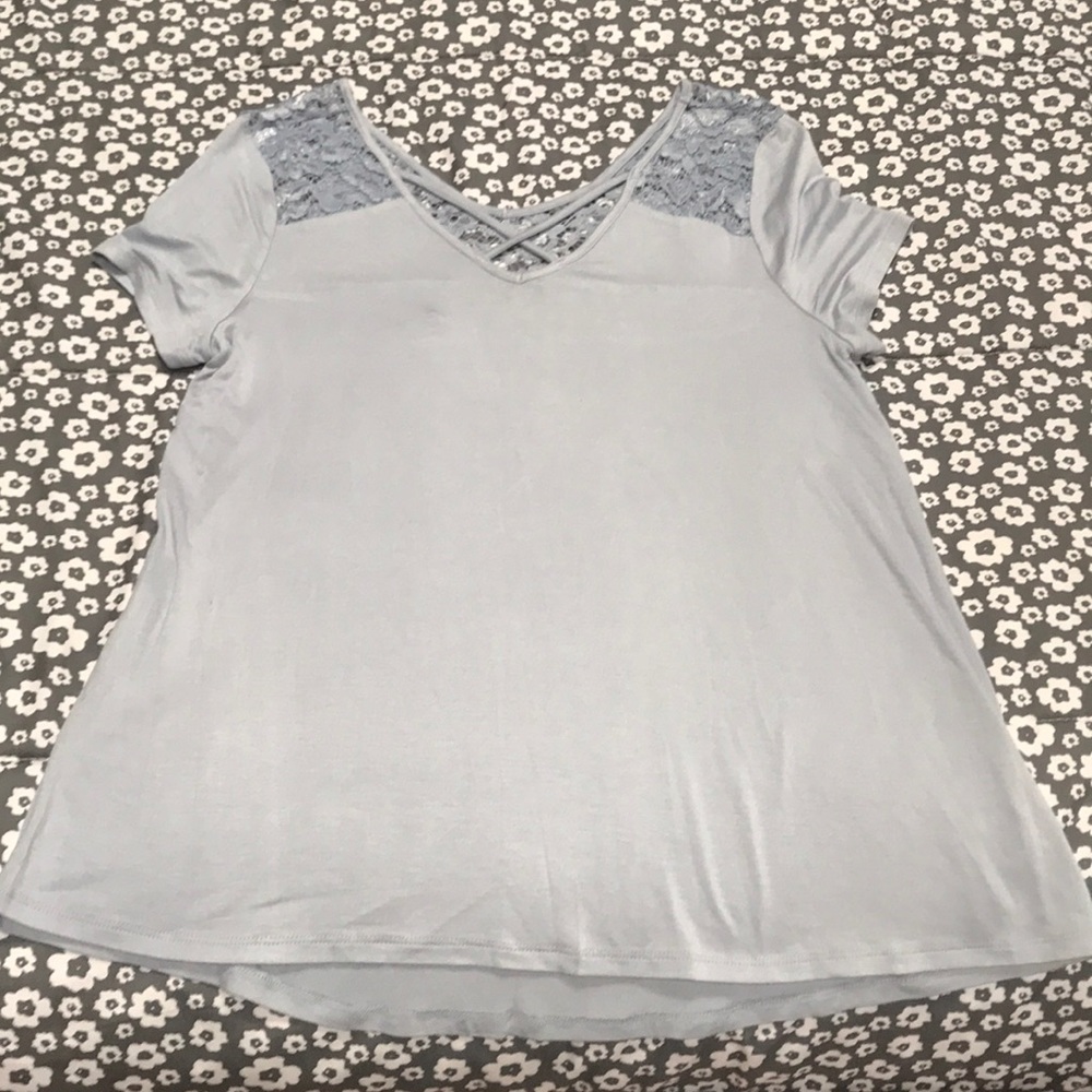 Short sleeved dressy top with lace detailing.